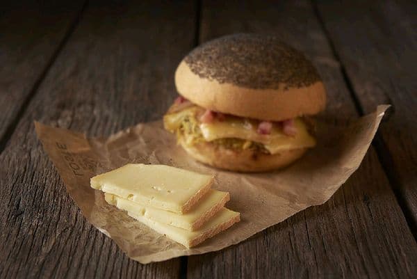 Fromage à raclette tranché, 8 barquettes de 400g